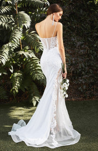 off white bridal gown with mesh and lace embellishments. spaghetti strap, horsehair bottom hemlinel