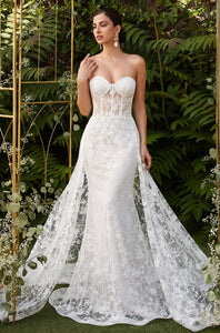 off white sweetheart shoulder line wedding gown with extended skirt 